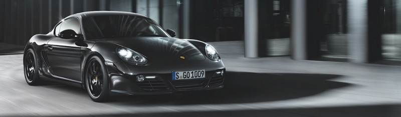 porsche cayman s black edition mj 2011 teaser 1 800x234 - Genf 2011: Mini Rocketman sorgt für Aufsehen auf dem Autosalon